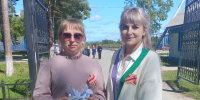 Центральная библиотека провела акцию "За победу над Японией" по вручению муаровых лент жителям - Библиотечно-музейный центр м. р. им. Полины Осипенко
