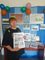 Книжная выставка "История и современность района имени Полины Осипенко"